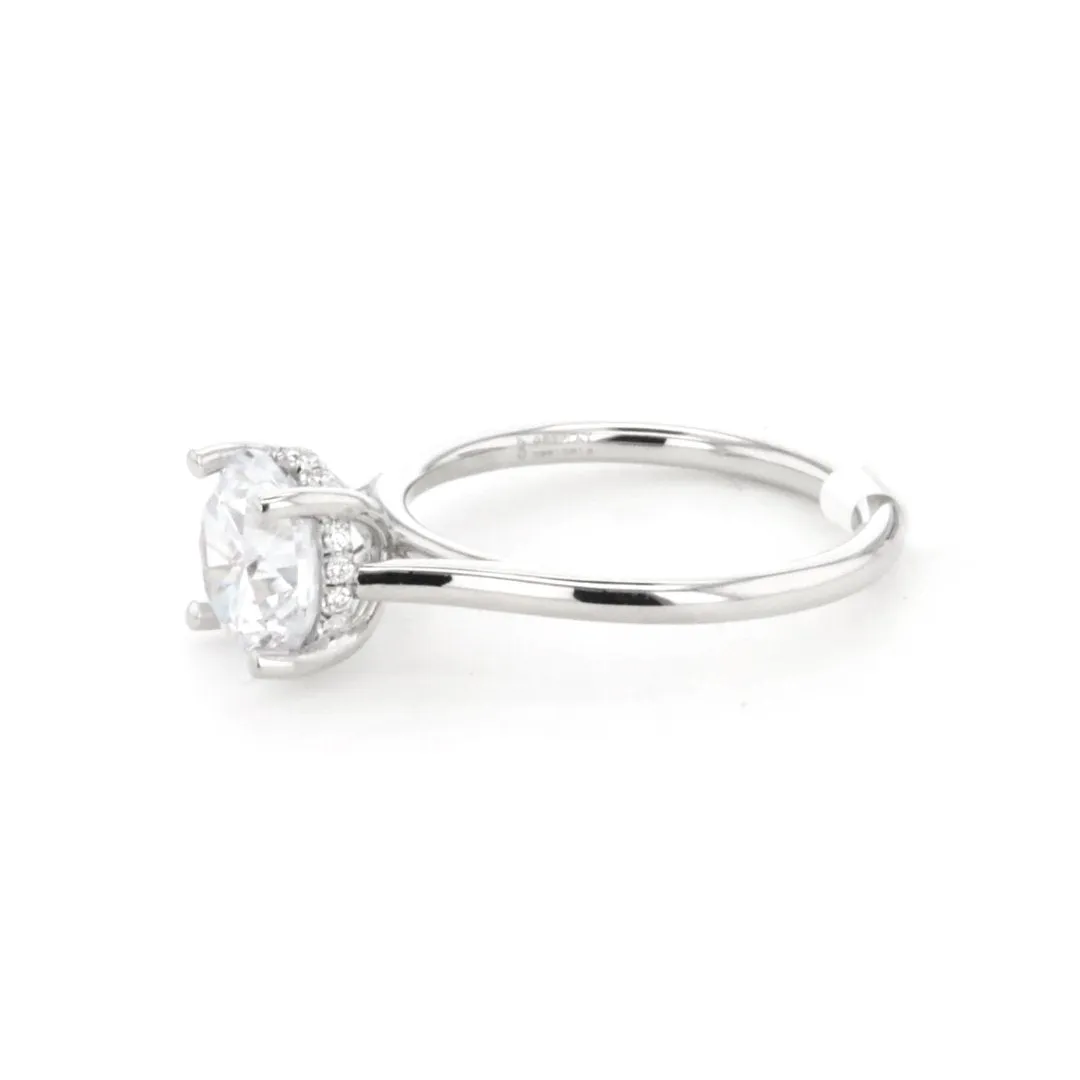 0.06 ctw Diamond Solitaire Engagement Ring