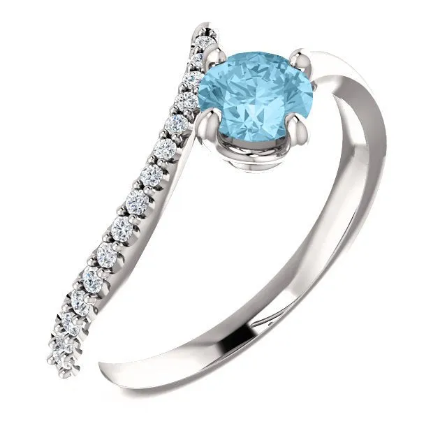 14KT GOLD 0.40 CT AQUAMARINE & 0.10 CTW DIAMOND BYPASS RING