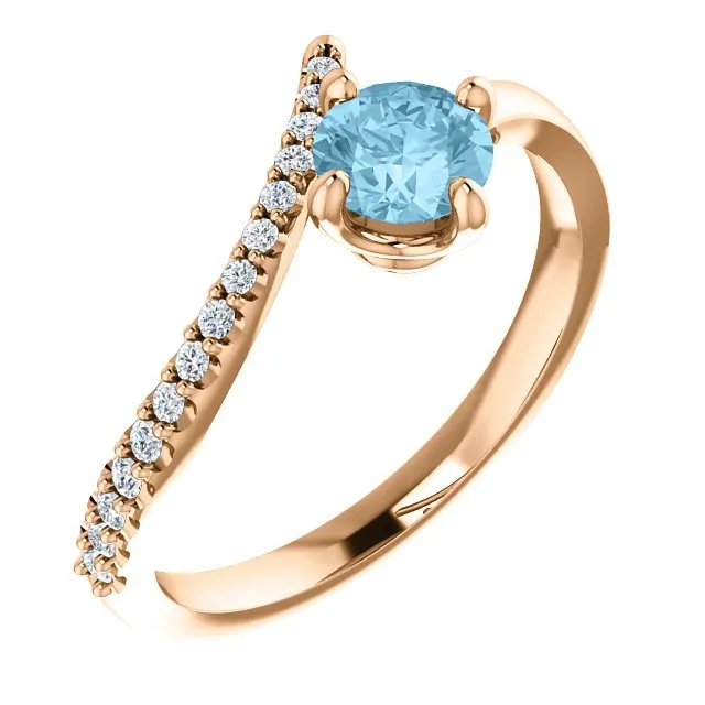 14KT GOLD 0.40 CT AQUAMARINE & 0.10 CTW DIAMOND BYPASS RING