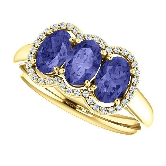 14KT GOLD 1.50 CTW TANZANITE & .10 CTW DIAMOND 3 STONE OVAL HALO RING