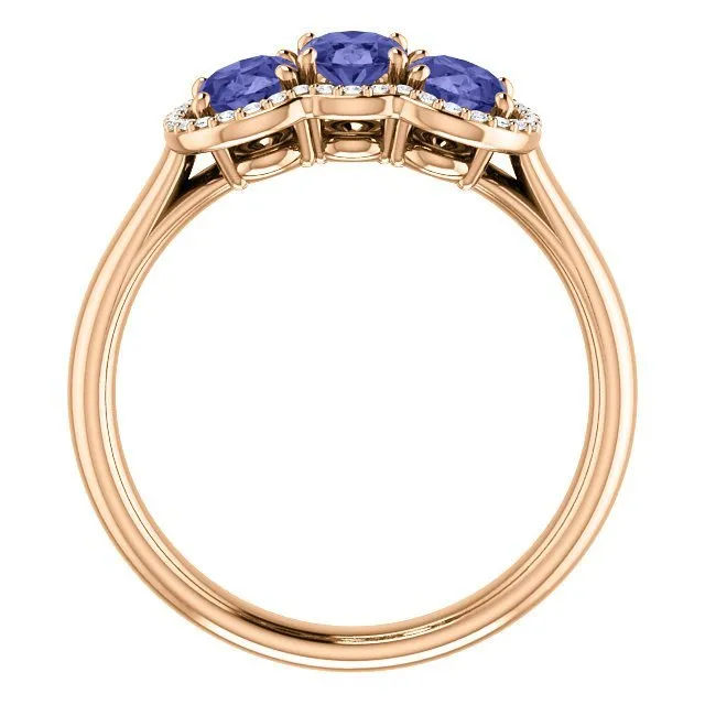 14KT GOLD 1.50 CTW TANZANITE & .10 CTW DIAMOND 3 STONE OVAL HALO RING