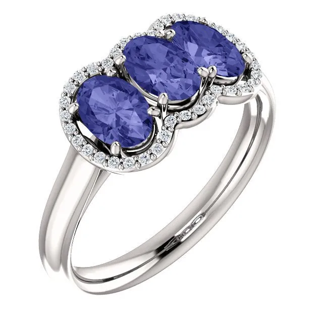 14KT GOLD 1.50 CTW TANZANITE & .10 CTW DIAMOND 3 STONE OVAL HALO RING