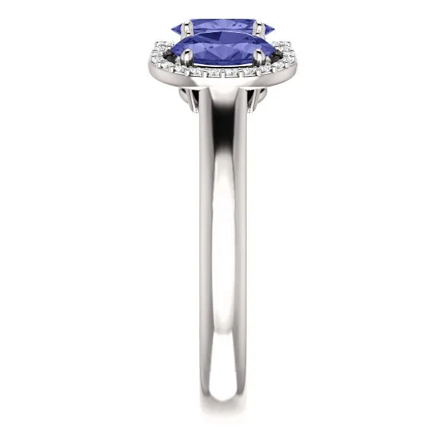 14KT GOLD 1.50 CTW TANZANITE & .10 CTW DIAMOND 3 STONE OVAL HALO RING