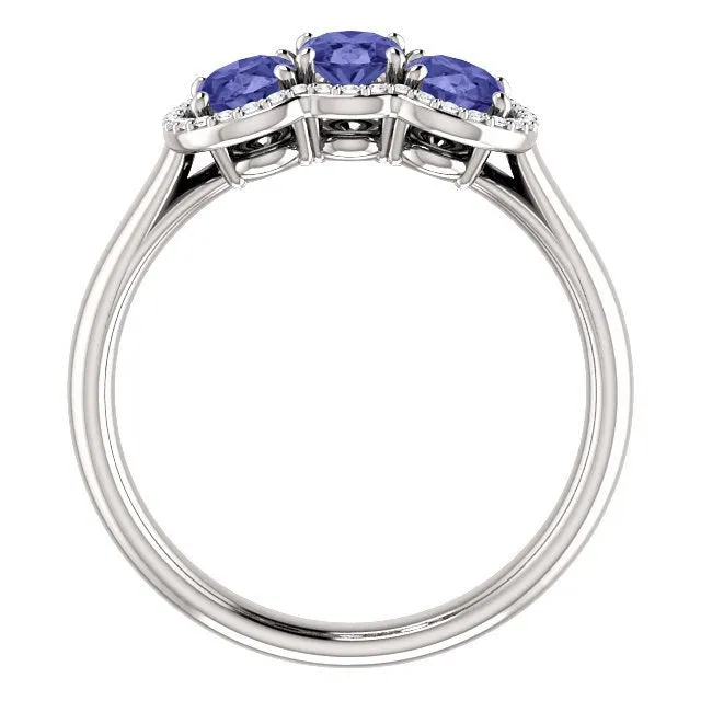 14KT GOLD 1.50 CTW TANZANITE & .10 CTW DIAMOND 3 STONE OVAL HALO RING